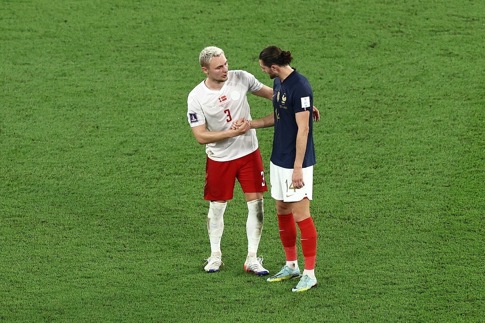 Arsenal pursue 24yo with €25m release clause 3 DOHA, QATAR: Victor Nelsson of Denmark and Adrien Rabiot of France shake hands after the FIFA World Cup Qatar 2022 Group D match between France and Denmark at Stadium 974 on November 26, 2022. (Photo by Tim Nwachukwu/Getty Images)