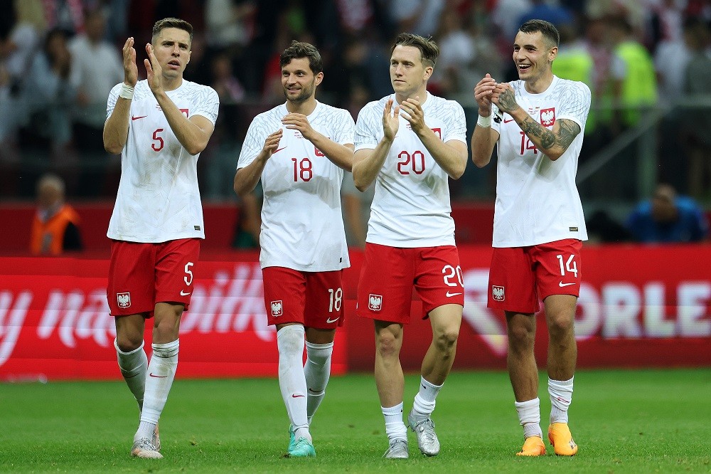 WARSAW, POLAND: Jan Bednarek, Bartosz Bereszynski, Piotr Zielinski, and Jakub Kiwior of Poland applaud fans after the international friendly match between Poland and Germany at Stadion Narodowy on June 16, 2023. (Photo by Maja Hitij/Getty Images)