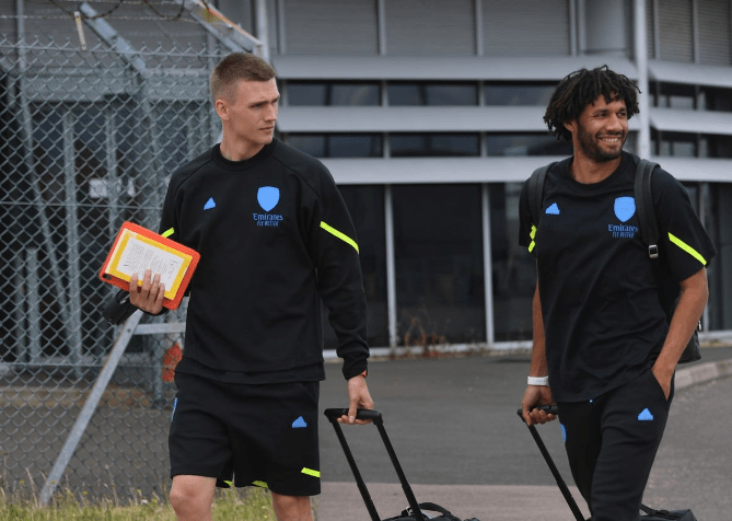 LUTON, ENGLAND: Runar Alex Runarsson and Mo Elneny of Arsenal board the team flight to Germany at Luton Airport on July 09, 2023. (Photo by Stuart ...
