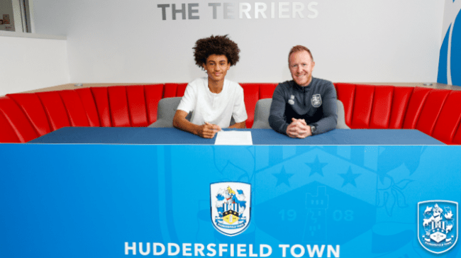 Arsenal defender signs for Huddersfield Town 2 Anthony Gregory signs for Huddersfield Town (image via Huddersfield Town)