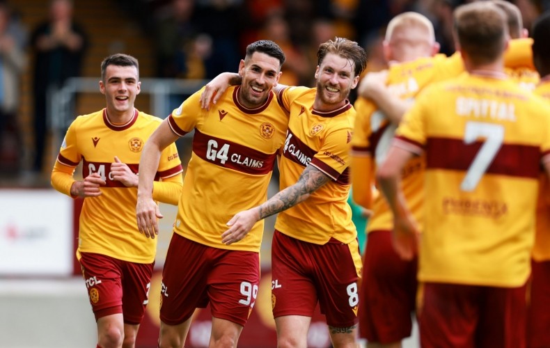 Conor Wilkinson goes to celebrate his goal with assist provider Mika Biereth (Photo via Motherwell)