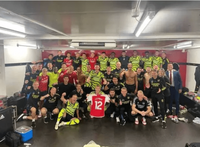 Arsenal new boy taken back by Odegaard gesture 4 The squad held up Timber's shirt in the dressing room ( Image: jurrientimber/Instagram)