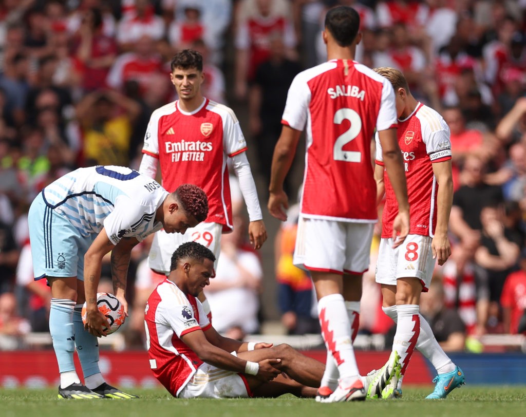 Mikel Arteta hints injured Arsenal star is out for the season 3 LONDON, ENGLAND - AUGUST 12: Jurrien Timber of Arsenal goes down with an injury during the Premier League match between Arsenal FC and Nottingham Forest at Emirates Stadium on August 12, 2023 in London, England. (Photo by Julian Finney/Getty Images)