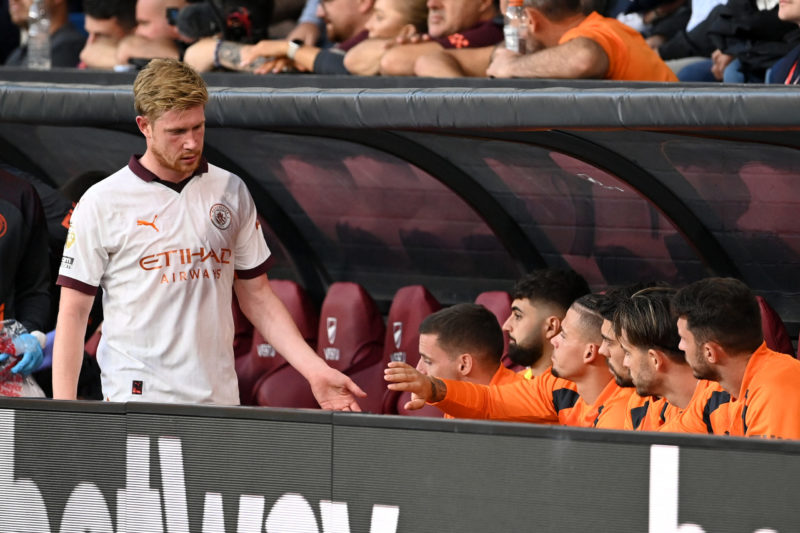 BURNLEY, ENGLAND - AUGUST 11: Kevin De Bruyne of Manchester City looks dejected after sustaining an injury during the Premier League match between Burnley FC and Manchester City at Turf Moor on August 11, 2023 in Burnley, England. (Photo by Michael Regan/Getty Images)