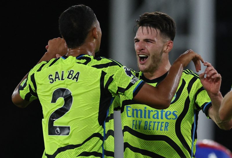 Arsenal's French defender #02 William Saliba (L) and Arsenal's English midfielder #41 Declan Rice celebrate after during the English Premier League football match between Crystal Palace and Arsenal at Selhurst Park in south London on August 21, 2023. Arsenal won the game 0-1. (Photo by ADRIAN DENNIS/AFP via Getty Images)