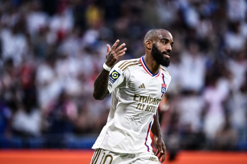 Lyon's French forward #10 Alexandre Lacazette celebrates scoring his team's first goal during the French L1 football match between Olympique Lyonna...