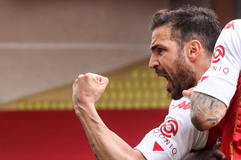Monaco's Spanish midfielder Cesc Fabregas celebrates with teammates after scoring a goal during the French L1 football match between AS Monaco and ...