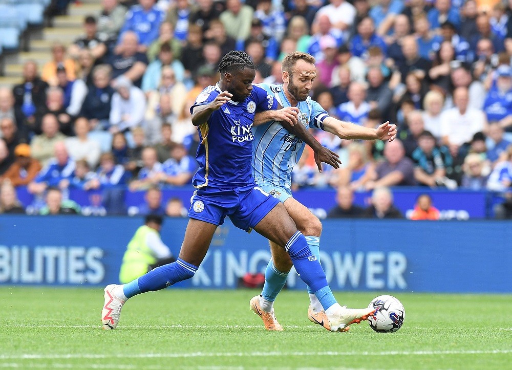LEICESTER, ENGLAND: Stephy Mavididi of Leicester City is challenged by Liam Kelly of Coventry City during the Sky Bet Championship match between Le...