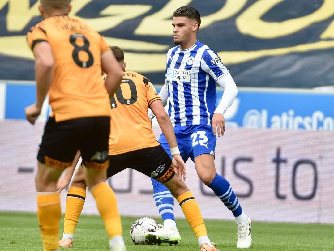 Omar Rekik plays for Wigan Athletic (Photo via Rekik on Instagram)