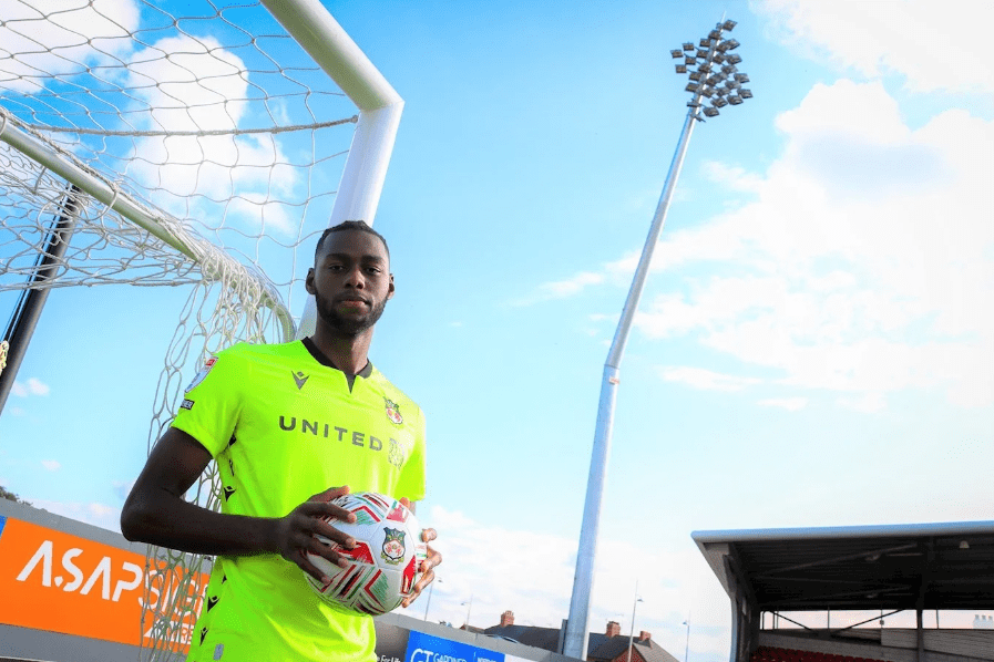 Arthur Okonkwo after signing for Wrexham (Photo via Wrexham on Twitter)