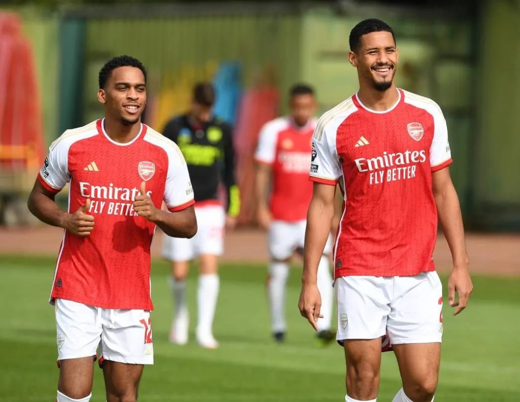 Jurrien Timber and William Saliba during the Arsenal squad photoshoot (Photo via afcstuff on Twitter)