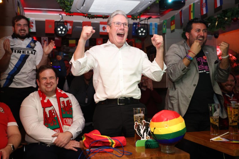 Labour Party leader Sir Keir Starmer celebrates an England goal as he watches the FIFA World Cup Qatar 2022 Group B match between Wales and England...