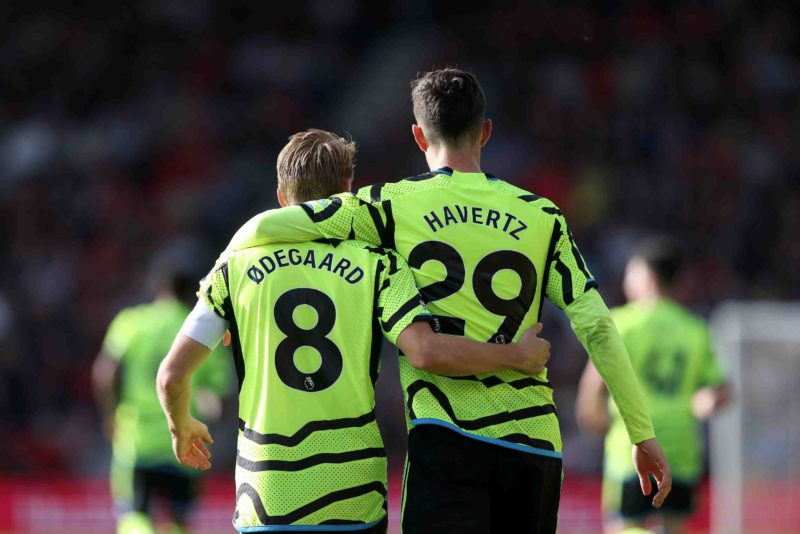 Arsenal star signs lucrative 3-year PUMA deal 2 BOURNEMOUTH, ENGLAND - SEPTEMBER 30: Kai Havertz of Arsenal celebrates with teammate Martin Oedegaard after scoring the team's third goal from a penalty during the Premier League match between AFC Bournemouth and Arsenal FC at Vitality Stadium on September 30, 2023 in Bournemouth, England. (Photo by Christopher Lee/Getty Images)