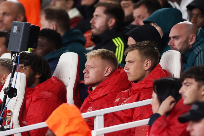 Did Emi Martinez accidentally reveal Aaron Ramsdale's next club? 3 LONDON, ENGLAND - SEPTEMBER 20: Aaron Ramsdale of Arsenal looks on from the substitution bench during the UEFA Champions League match between Arsenal FC and PSV Eindhoven at Emirates Stadium on September 20, 2023 in London, England. (Photo by Alex Pantling/Getty Images)