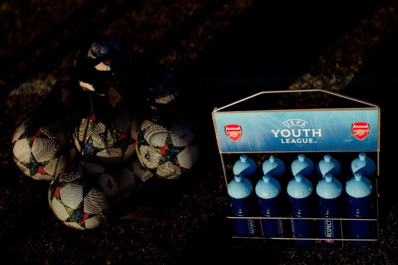 MAJADAHONDA, SPAIN - JANUARY 27: A basket of isotonic drinks an another of balls are left on the pitch before the UEFA Youth League match between A...