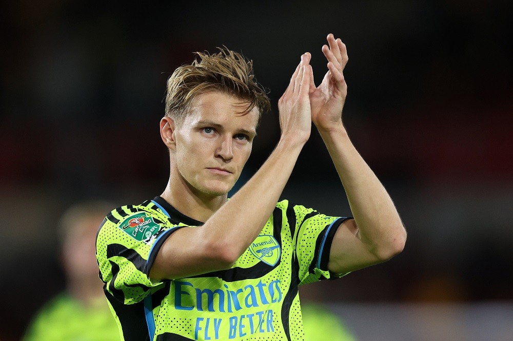 BRENTFORD, ENGLAND: Martin Oedegaard of Arsenal applauds fans following the Carabao Cup Third Round match between Brentford and Arsenal at Gtech Co...