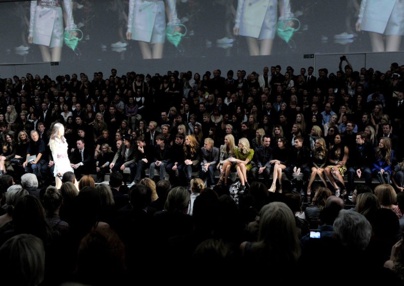 LONDON, ENGLAND - SEPTEMBER 21: Angela Ahrendts, Mario Testino, Poppy Delevingne, Donna Air, actor Aaron Paul, Alexa Chung, model Douglas Booth, actress Sarah Jessica Parker, tennis player Serena Williams, tennis player Andy Murray and Kim Sears attend the Burberry Prorsum Spring/Summer 2011 fashion show during LFW at Chelsea College of Art and Design on September 21, 2010 in London, England.  (Photo by Gareth Cattermole/Getty Images for Burberry)