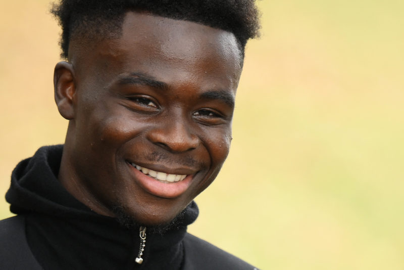 Arsenal's English midfielder Bukayo Saka arrives to attend the catwalk presentation for British fashion house Burberry's Spring/Summer 2024 collect...