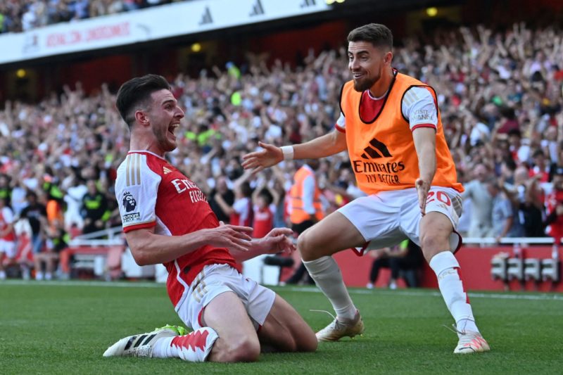 Arteta u-turn! Jorginho set to stay at Arsenal? 3 Arsenal's English midfielder #41 Declan Rice celebrates with Arsenal's Italian midfielder #20 Jorginho (R) after scoring their late second goal during the English Premier League football match between Arsenal and Manchester United at the Emirates Stadium in London on September 3, 2023. (Photo by GLYN KIRK/AFP via Getty Images)