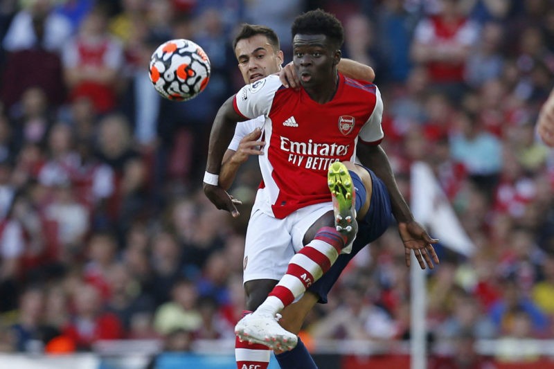 Mikel Arteta on Manchester United's 'good example' 5 Arsenal's English midfielder Bukayo Saka (R) vies with Tottenham Hotspur's Spanish defender Sergio Reguilon (L) during the English Premier League football match between Arsenal and Tottenham Hotspur at the Emirates Stadium in London on September 26, 2021. - (Photo by IAN KINGTON/IKIMAGES/AFP via Getty Images)