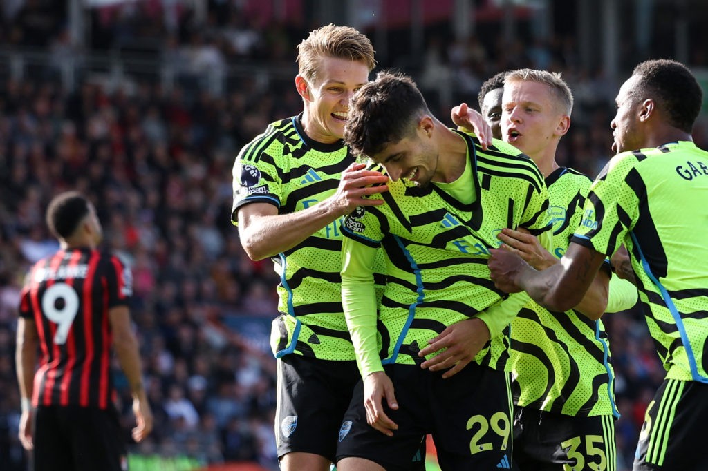Arsenal's German midfielder #29 Kai Havertz (C) and his teammates celebrate scoring the third goal from the penalty spot during the English Premier League football match between Bournemouth and Arsenal at the Vitality Stadium in Bournemouth, southern England on September 30, 2023. (Photo by ADRIAN DENNIS/AFP via Getty Images)