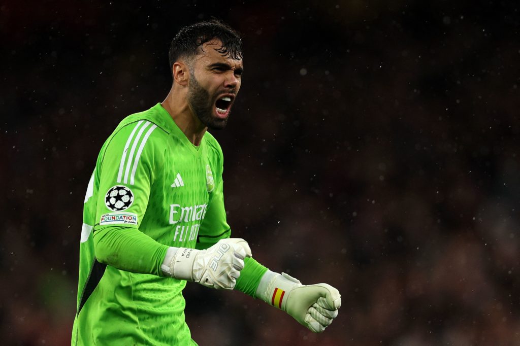 Arsenal's Spanish goalkeeper #22 David Raya celebrates the team's third goal during the UEFA Champions League Group B football match between Arsenal and PSV Eindhoven at the Arsenal Stadium in north London on September 20, 2023. (Photo by ADRIAN DENNIS/AFP via Getty Images)