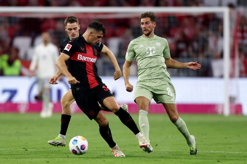 Granit Xhaka error allows Harry Kane to score 2 MUNICH, GERMANY - SEPTEMBER 15: Leon Goretzka of Bayern Munich plays a pass ahead of Granit Xhaka of Bayer Leverkusen during the Bundesliga match between FC Bayern München and Bayer 04 Leverkusen at Allianz Arena on September 15, 2023 in Munich, Germany. (Photo by Lars Baron/Getty Images)
