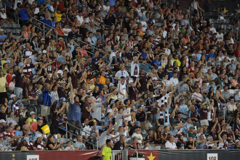 COMMERCE CITY, CO - JULY 03: Fans of the Colorado Rapids react to the game against the Houston Dynamo at Dicks Sporting Goods Park on July 3, 2011 ...