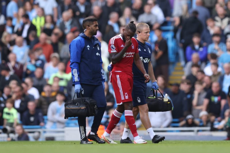 MANCHESTER, ENGLAND - SEPTEMBER 23: Nuno Tavares of Nottingham Forest leaves the pitch due to injury during the Premier League match between Manche...