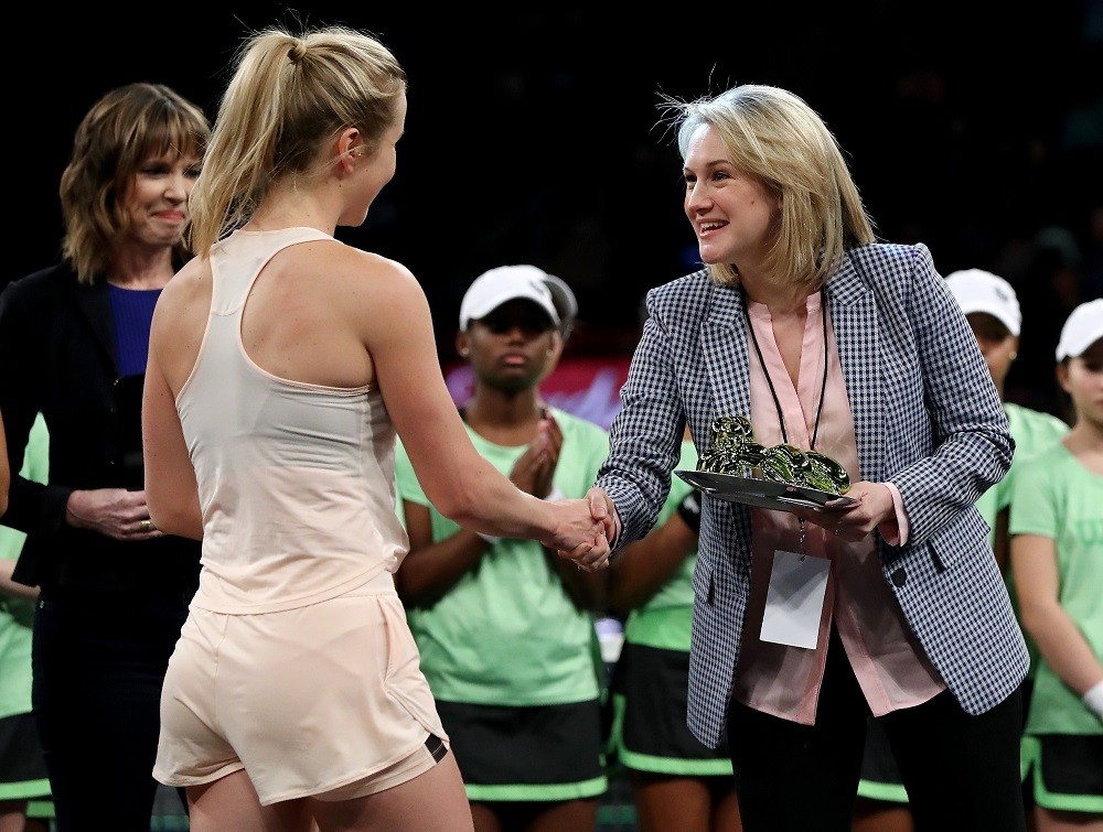 NEW YORK, NY: Felicity Barnard, CEO of Tie Break Tens presents winner Elina Svitolina of Ukraine with the trophy during the Tie Break Tens at Madis...