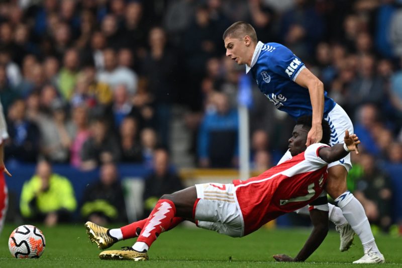 VAR does it again as Arsenal finally beat Everton at Goodison 5 TOPSHOT - Arsenal's English midfielder #07 Bukayo Saka (L) vies with Everton's Ukrainian defender #19 Vitaliy Mykolenko (R) during the English Premier League football match between Everton and Arsenal at Goodison Park in Liverpool, north west England on September 17, 2023. (Photo by PAUL ELLIS/AFP via Getty Images)