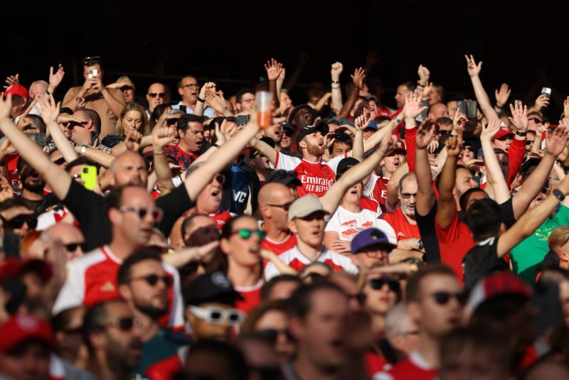 LONDON, ENGLAND - OCTOBER 08: Arsenal fans cheerduring the Premier League match between Arsenal FC and Manchester City at Emirates Stadium on Octob...