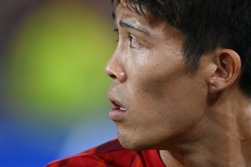 Arsenal's Japanese defender #18 Takehiro Tomiyasu reacts prior to the English League Cup third round football match between Brentford and Arsenal a...