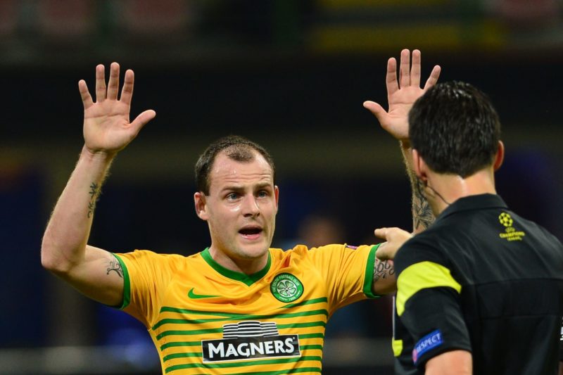 Celtic's forward of Ireland Anthony Stokes gestures in front of Referee Wolfgang Stark during the Champions League football match AC Milan vs Celti...