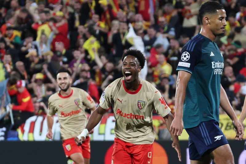 Lens' French forward #09 Elye Wahi celebrates after scoring his team's second goal during the UEFA Champions League Group B first leg football matc...