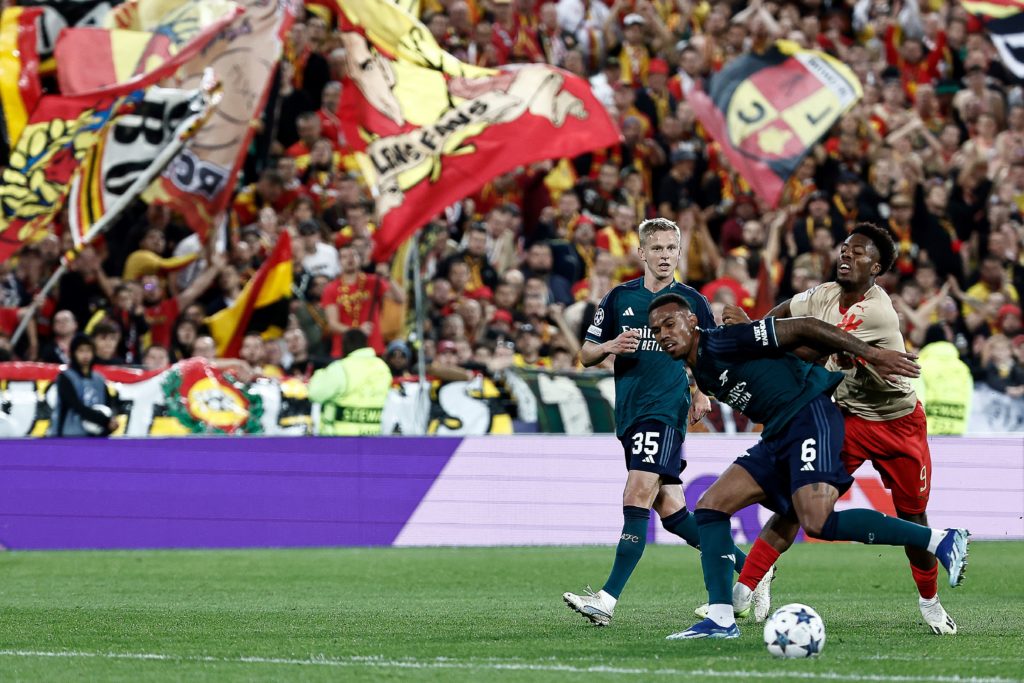 Arsenal 25yo mocks RC Lens after Wednesday's thrashing 3 Arsenal's Brazilian defender #06 Gabriel Magalhaes (L) and Lens' French forward #09 Elye Wahi fight for the ball during the UEFA Champions League Group B first leg football match between RC Lens and Arsenal FC at the Bollaert Stadium in Lens, northern France, on October 3, 2023. (Photo by SAMEER AL-DOUMY/AFP via Getty Images)
