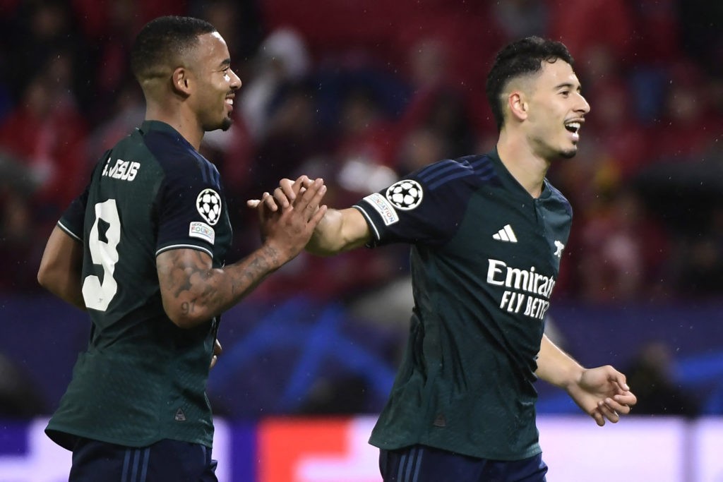 Arsenal's Brazilian midfielder #11 Gabriel Martinelli (R) celebrates scoring the opening goal with Arsenal's Brazilian forward #09 Gabriel Jesus during the UEFA Champions League 1st round day 3 Group B football match between Sevilla FC and Arsenal at the Ramon Sanchez Pizjuan stadium in Seville on October 24, 2023. (Photo by CRISTINA QUICLER/AFP via Getty Images)