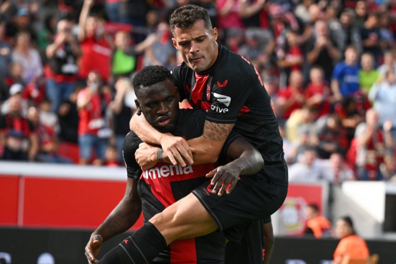 Arsenal striking target Boniface says he's a Gunner at heart 3 Bayer Leverkusen's Nigerian forward #22 Victor Boniface (L) is celebrated Bayer Leverkusen's Swiss midfielder #34 Granit Xhaka after scoring the 1-0 goal during the German first division Bundesliga football match between Bayer Leverkusen and FC Heidenheim in Leverkusen, western Germany, on September 24, 2023. (Photo by INA FASSBENDER/AFP via Getty Images)