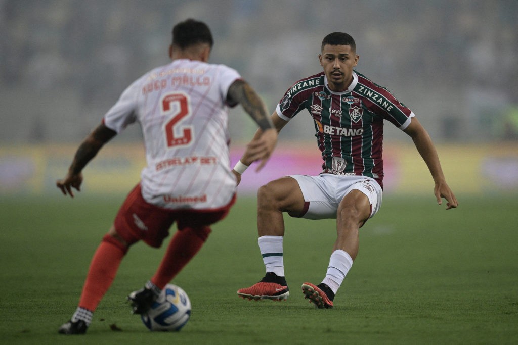 Internacional's Spanish defender Hugo Mallo and Fluminense's midfielder Andre Trindade fight for the ball during the all-Brazilian Copa Libertadores semifinals first leg football match between Fluminense and Internacional, at the Maracana stadium, in Rio de Janeiro, Brazil on September 27, 2023. (Photo by CARL DE SOUZA/AFP via Getty Images)