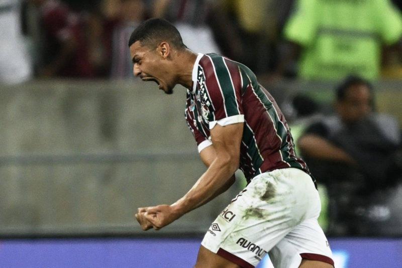 Fluminense's midfielder Andre Trindade celebrates after scoring during the Copa Libertadores quarterfinals first leg football match between Brazil'...