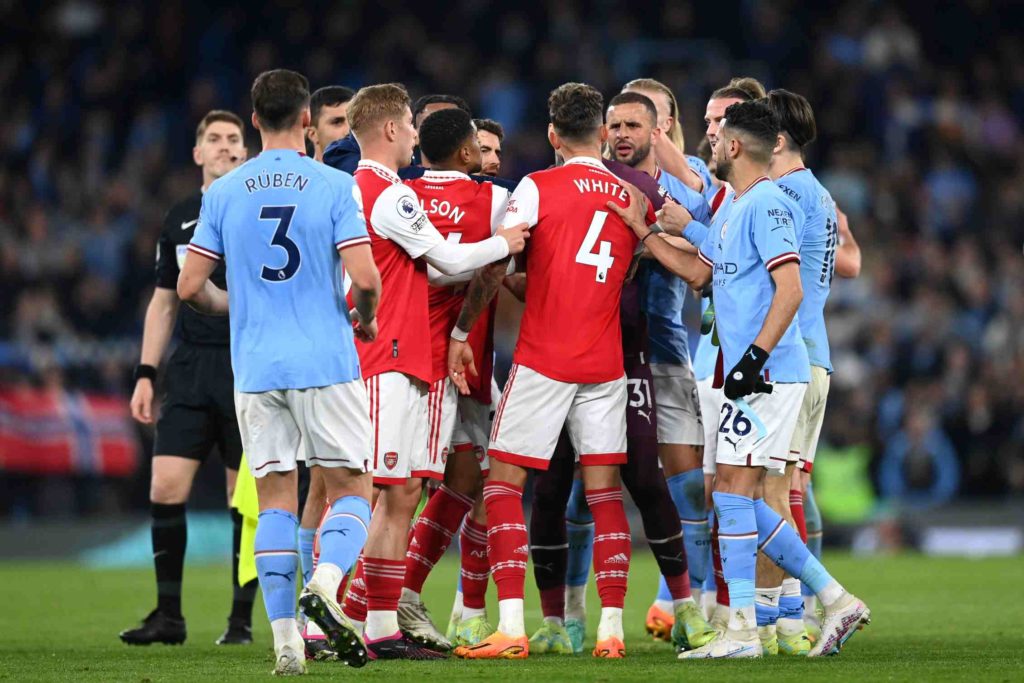 MANCHESTER, ENGLAND - APRIL 26: Kyle Walker of Manchester City clashes with Ben White of Arsenal after the Premier League match between Manchester City and Arsenal FC at Etihad Stadium on April 26, 2023 in Manchester, England. (Photo by Michael Regan/Getty Images)