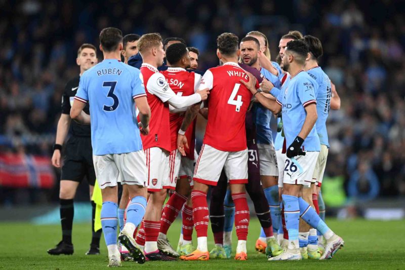 MANCHESTER, ENGLAND - APRIL 26: Kyle Walker of Manchester City clashes with Ben White of Arsenal after the Premier League match between Manchester ...