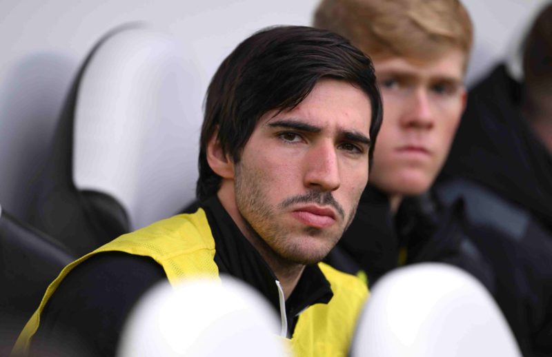 NEWCASTLE UPON TYNE, ENGLAND - OCTOBER 21: Sandro Tonali of Newcastle looks on from the substitutes bench prior to the Premier League match between...