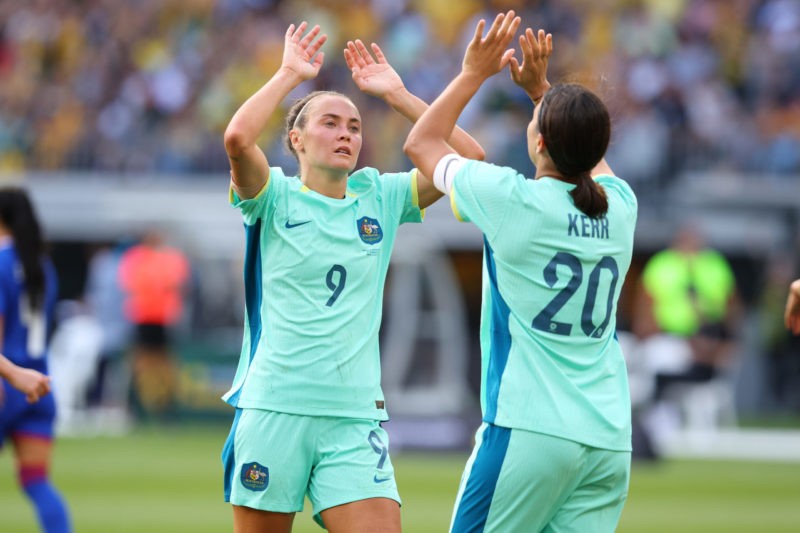 PERTH, AUSTRALIA - OCTOBER 29: Caitlin Foord of the Matildas high fives Sam Kerr of the Matildas after her goal during the AFC Women's Asian Olympi...