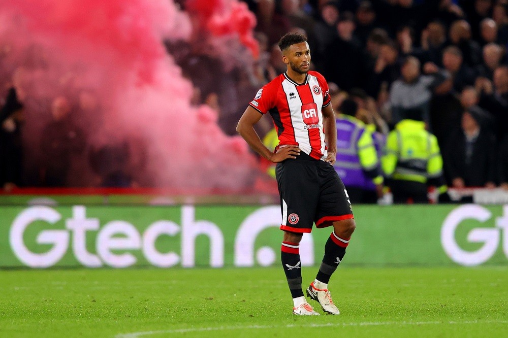 SHEFFIELD, ENGLAND: Auston Trusty of Sheffield United looks dejected after conceding the team's second goal during the Premier League match between...
