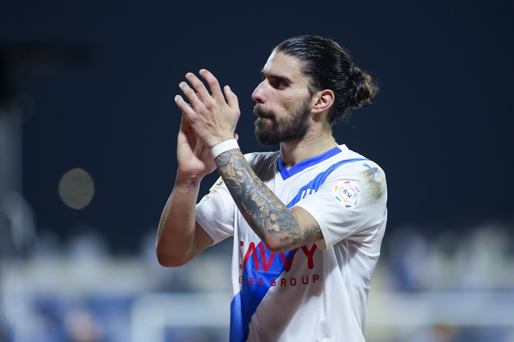 AL AHSAA, SAUDI ARABIA: Ruben Neves of Al Hilal victory celebrates after the Saudi Pro League match between Al Fateh and Al-Hilal at Prince Abdulla...