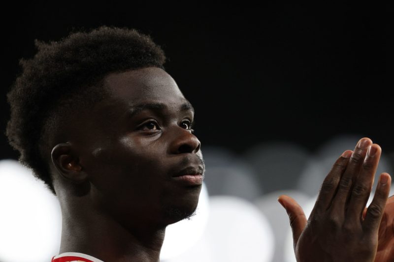 Arsenal's English midfielder #07 Bukayo Saka walks off the pitch after getting injured during the UEFA Champions League Group B football match betw...