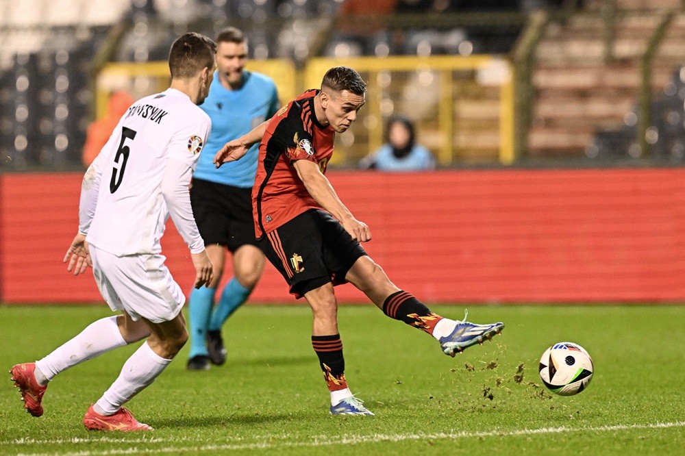 Belgium's Leandro Trossard (R) kicks the ball during the UEFA Champions League Qualifying Group F football match between Belgium and Azerbaijan at ...