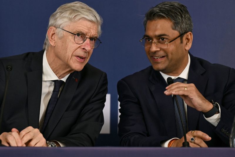 FIFA Chief of Global Football Development Arsène Wenger (L) and President of the All India Football Federation (AIFF) Kalyan Chaubey speak during a...