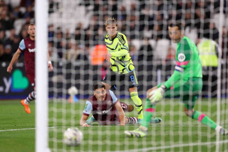 LONDON, ENGLAND - NOVEMBER 01: Martin Odegaard of Arsenal scores their sides first goal during the Carabao Cup Fourth Round match between West Ham ...